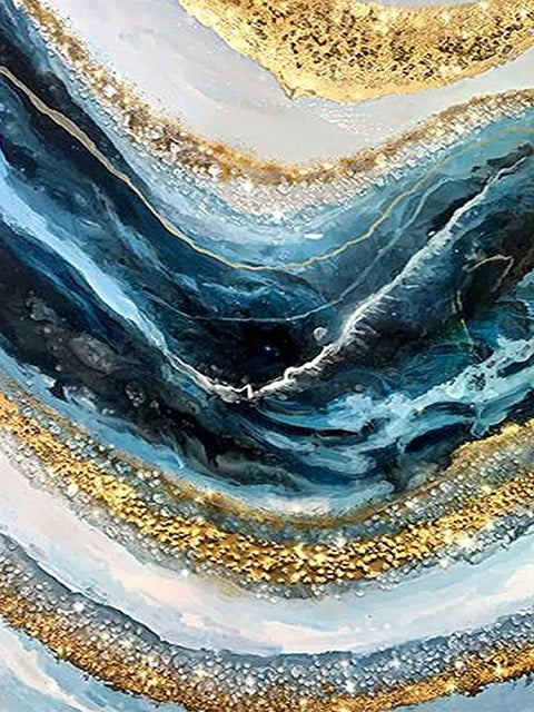 Abstract fluid acrylic painting with swirling layers of deep blue, navy, white, and shimmering metallic gold textures. Stone Veins of Gold - Diamond Painting