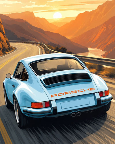 A light blue Porsche sports car shown from the rear three-quarter view, driving on a winding mountain road at sunset. The Porsche logo is visible on the trunk, with orange mountains and a glowing sun in the background. Porsche Sunset Drive - Diamond Painting