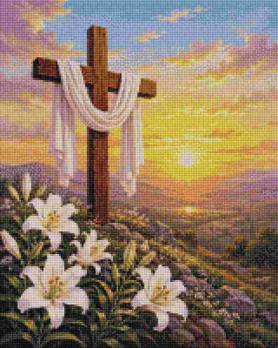 A scenic artwork showing a wooden cross draped with white cloth, set in a landscape with white lilies in the foreground and a glowing sunset sky in the background. Shrouded Cross Diamond Painting