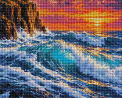 A colorful ocean sunset scene with crashing waves, white surf, blue-green water, dark rocky cliffs on the left, and a glowing orange and pink sky. Sunset Waves Rocks - Diamond Art