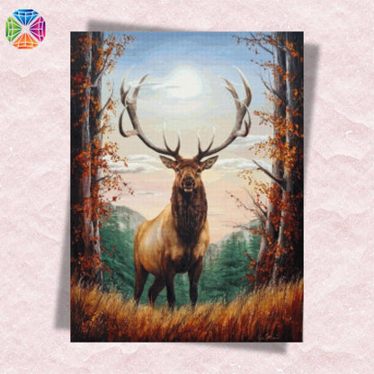 Elk diamond painting showing majestic elk standing in forest with mountains in background